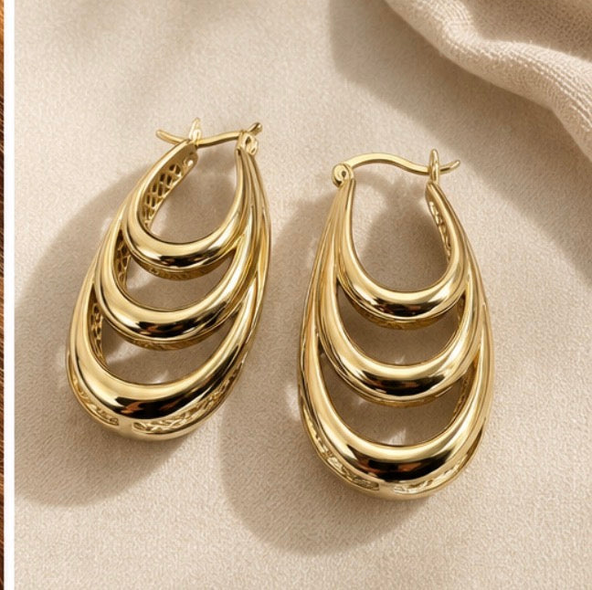 Layered gold statement earrings