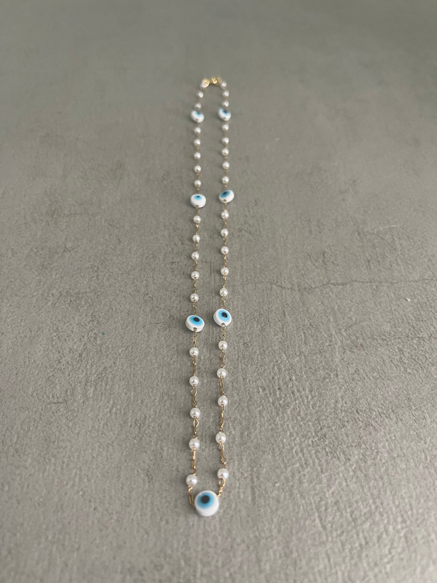 Eye pearl necklace