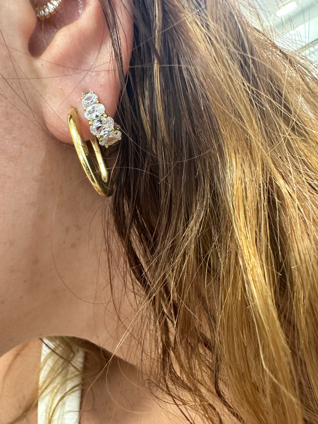 Elegant Gold Huggie Hoop Earrings with Oval-Cut CZ Stones