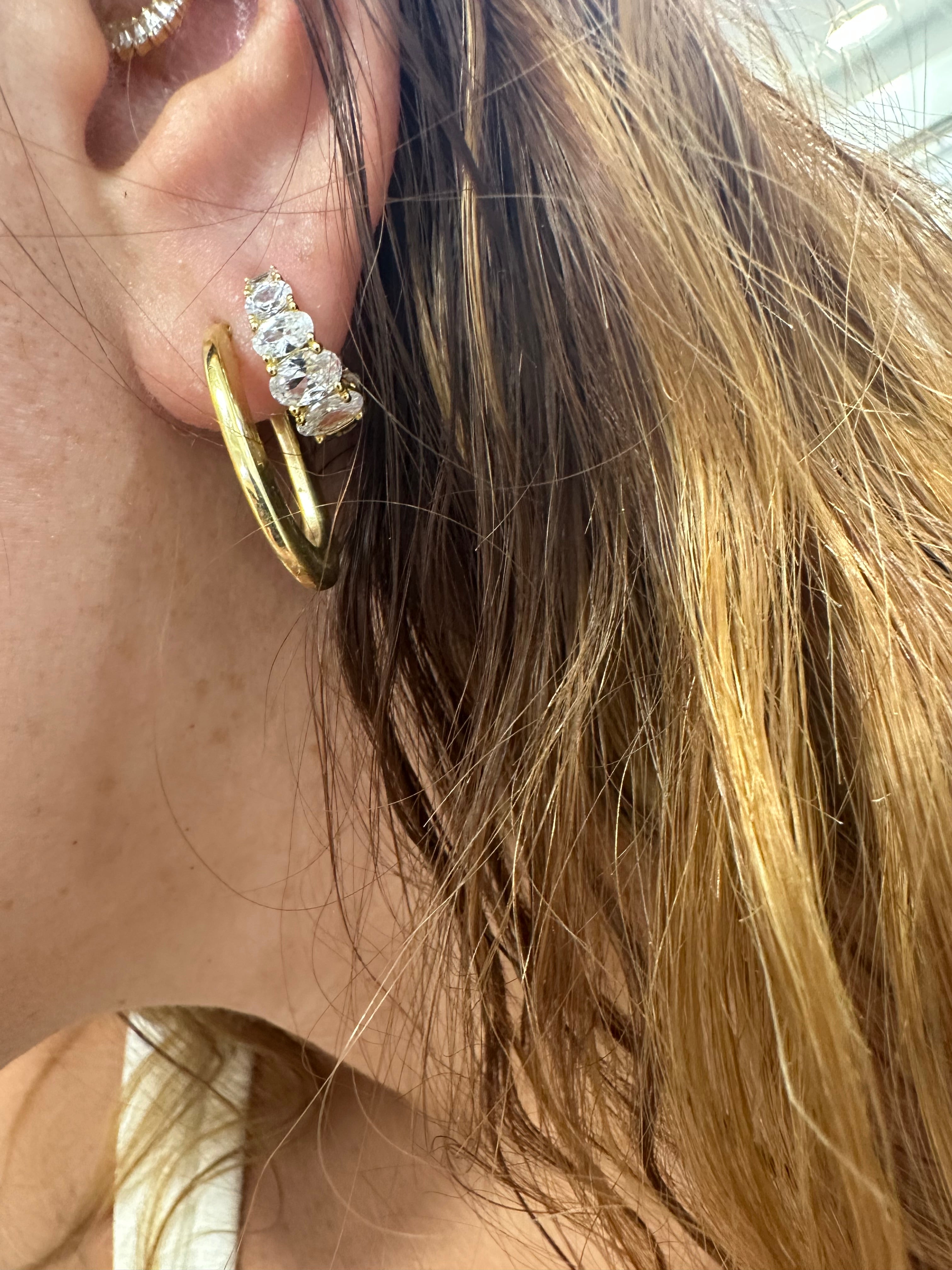 Elegant Gold Huggie Hoop Earrings with Oval-Cut CZ Stones