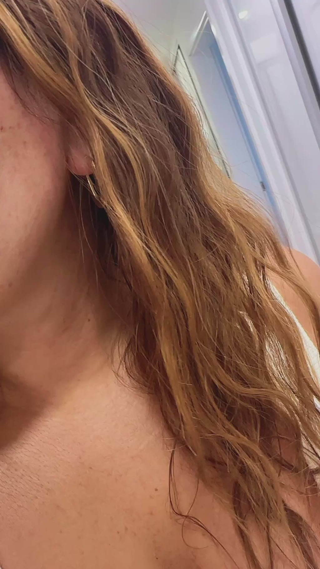 Elegant Gold Huggie Hoop Earrings with Oval-Cut CZ Stones