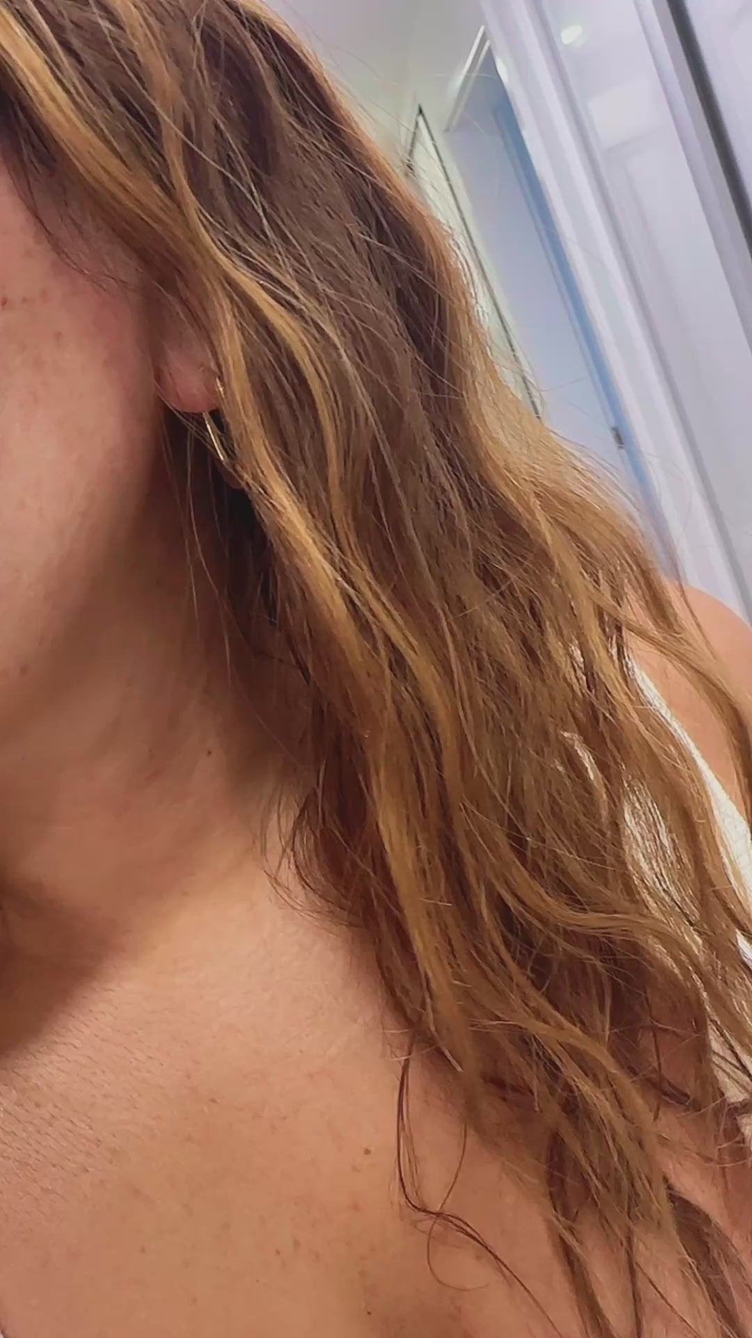 Elegant Gold Huggie Hoop Earrings with Oval-Cut CZ Stones